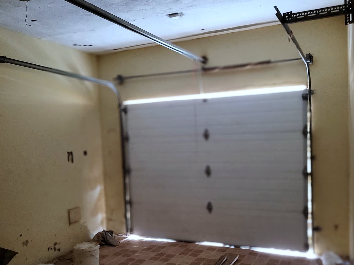 Internal garage with electric roller door