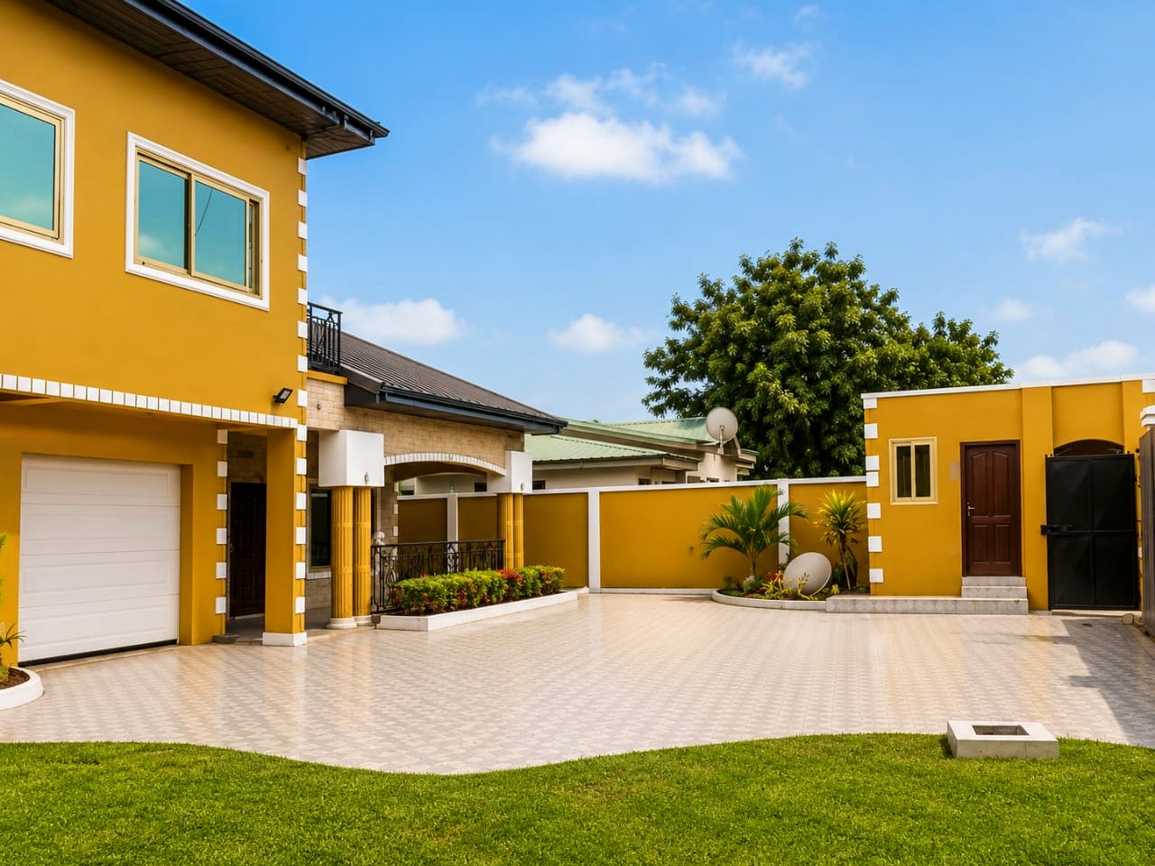 Courtyard, driveway and garage