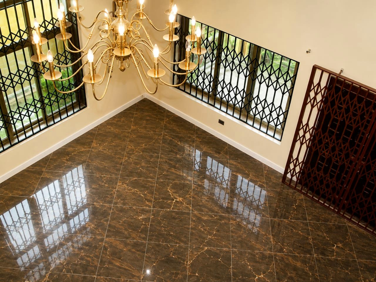 Marble flooring and brass lighting