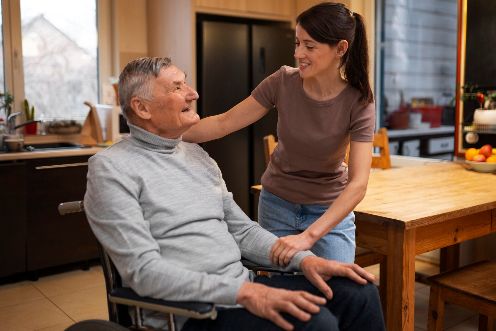 elderly-person-being-taken-care-by-female-caretaker